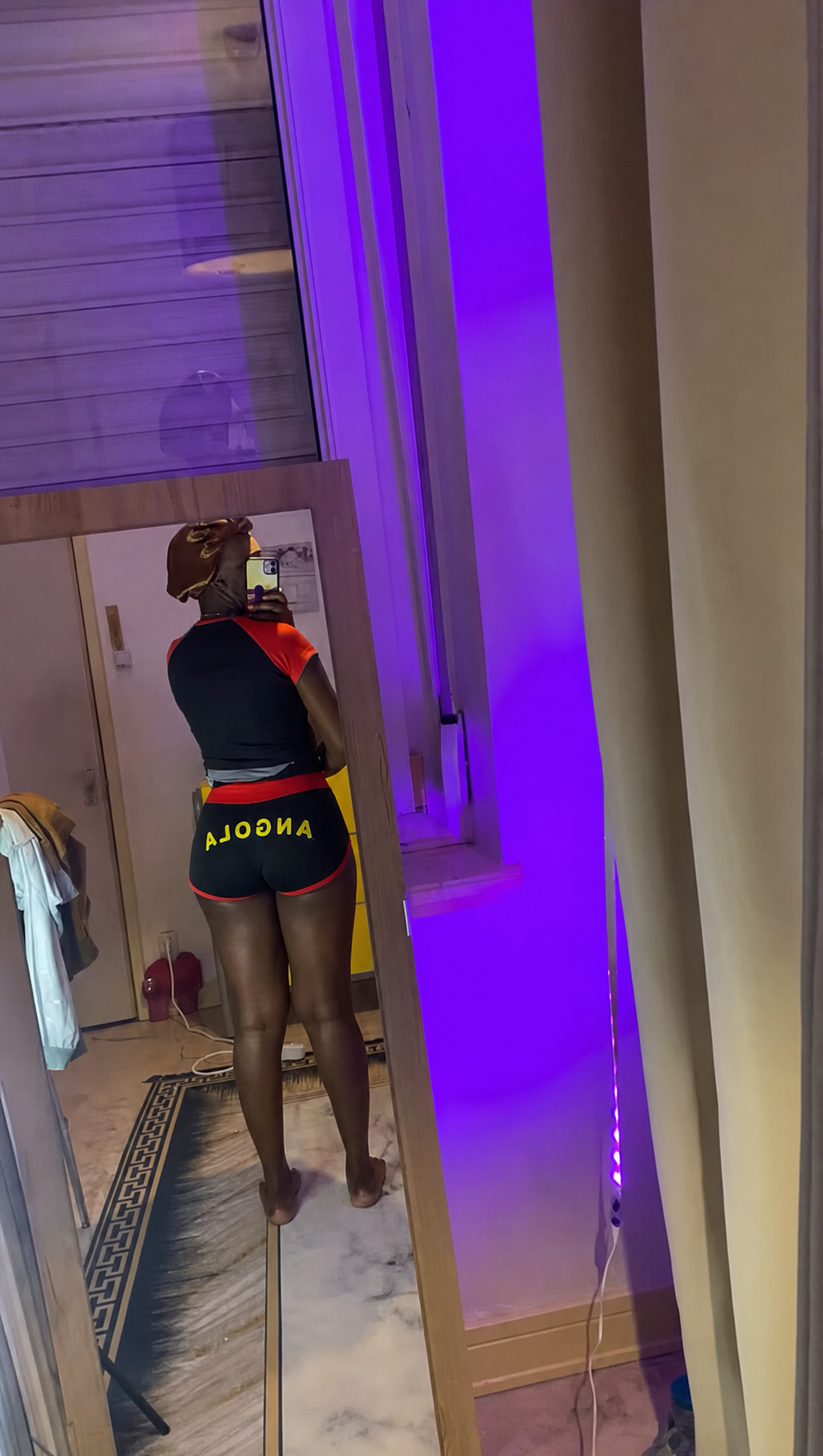 Angola model wearing the set