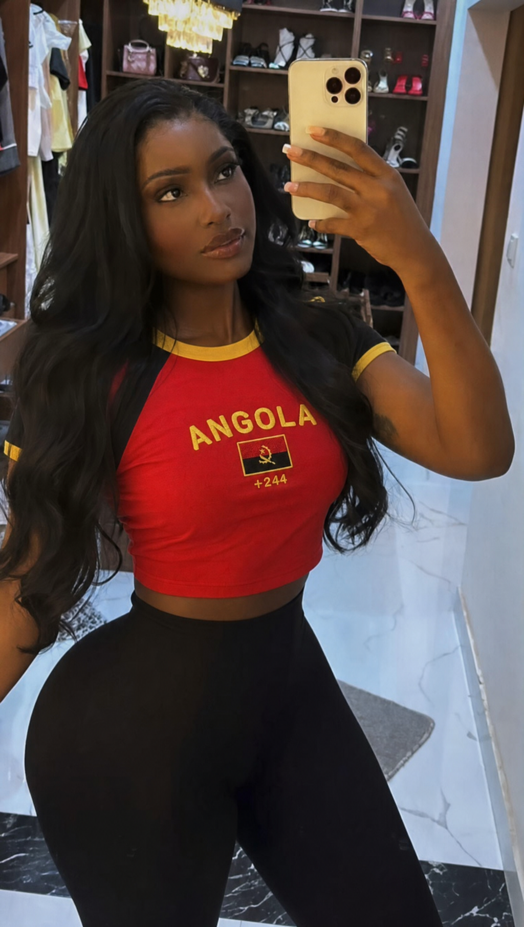 Angola model wearing the top